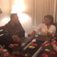 Friends shown playing the card game The Ultimate Clap Back.